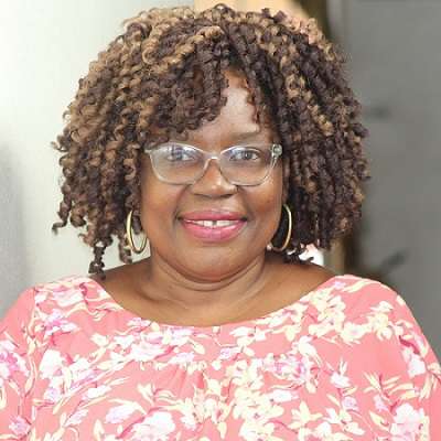 Mrs Mireille B. (General Secretary)